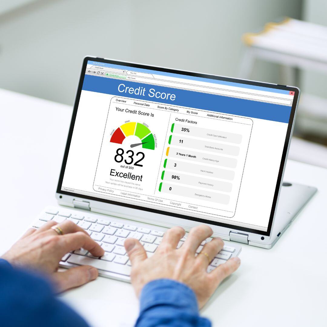 Monitoring credit score on a laptop